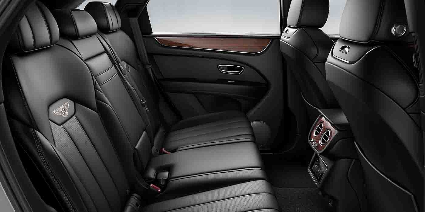 Bentley Fuzhou Bentley Bentayga EWB interior view for rear passengers with Beluga black hide.